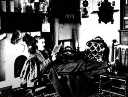 Brainerd smoking his pipe, ca. 1885